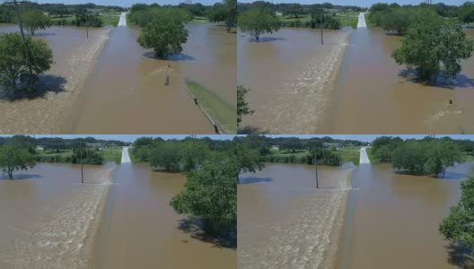 无人机拍摄的德克萨斯州一个小镇在暴雨和洪水中遭遇飓风哈维洪水后的低潮期高清在线视频素材下载