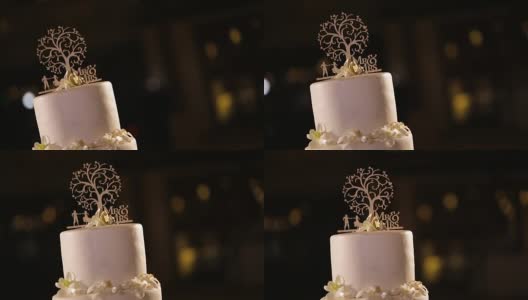带花的白色婚礼蛋糕。高清在线视频素材下载