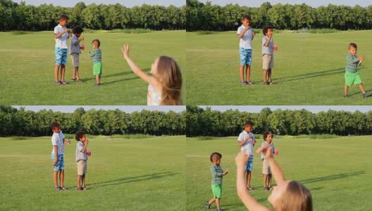 孩子们在空地上玩肥皂泡。高清在线视频素材下载