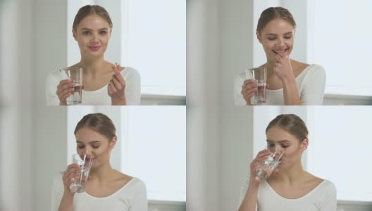 在白色的室内，一个女人在吃药，从玻璃里喝水高清在线视频素材下载
