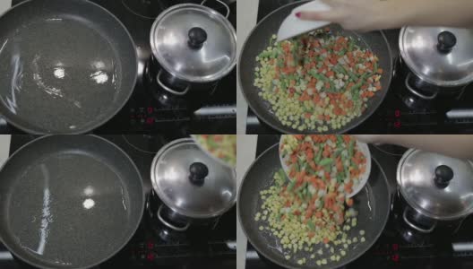 将冷冻蔬菜倒入热锅中，倒入油。豌豆，玉米，芦笋，胡萝卜高清在线视频素材下载