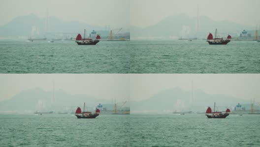 香港维多利亚港的红色帆船高清在线视频素材下载