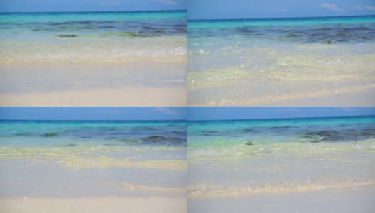 低角度海浪清澈的海洋马尔代夫白沙缓慢运动高清在线视频素材下载