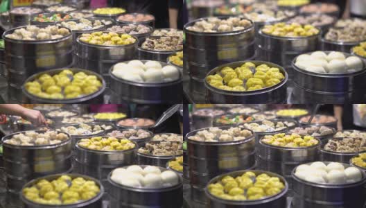 台湾亚洲街食品市场卖饺子和烧卖的4K小贩高清在线视频素材下载
