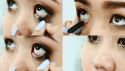 女性使用眼线化妆美容高清在线视频素材下载