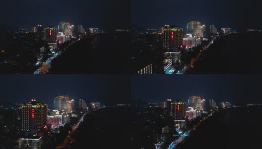 夜间照明海南岛三亚湾航拍全景图4k中国高清在线视频素材下载