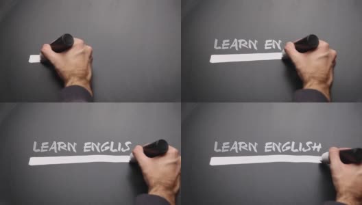 男子在黑板上写“学英语”高清在线视频素材下载