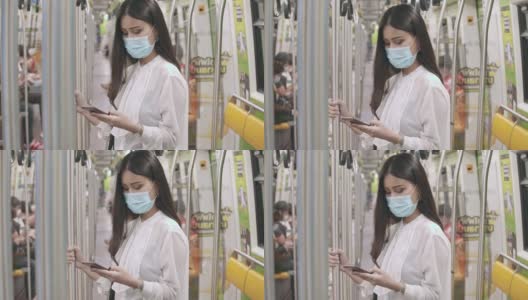 女商人在乘坐地铁时戴着保护面罩使用智能手机高清在线视频素材下载