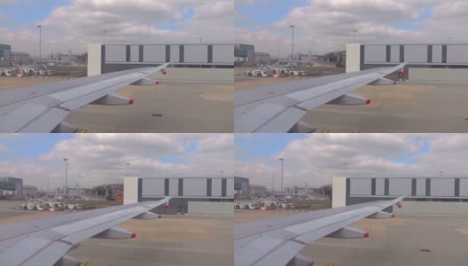 飞机在机场跑道上以250帧/秒的慢动作滑行高清在线视频素材下载
