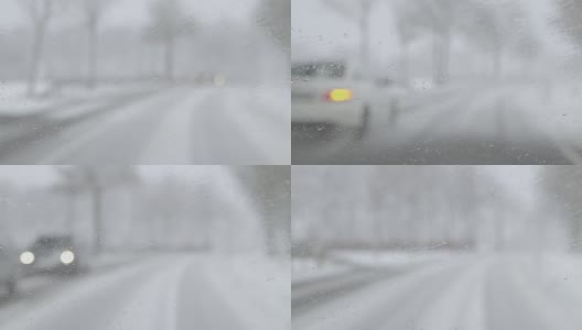 冬季驾驶-驾驶在一个下雪的乡村道路在雪序列聚焦挡风玻璃高清在线视频素材下载