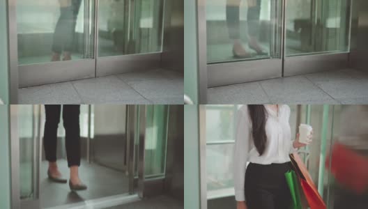 拿着购物袋乘电梯的年轻女子高清在线视频素材下载