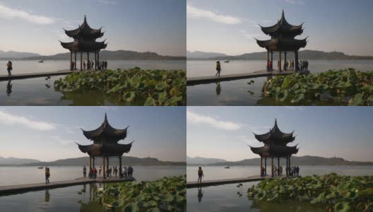 晴朗的一天时间杭州城著名的西湖码头宝塔慢镜头全景4k中国高清在线视频素材下载