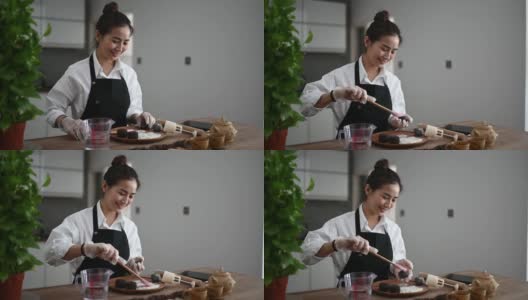 亚洲华人美丽的女人在她的厨房库存照片制作中国传统中秋节雪皮月饼…高清在线视频素材下载