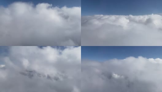 班轮飞行通过惊人的巨大的白色厚云高清在线视频素材下载