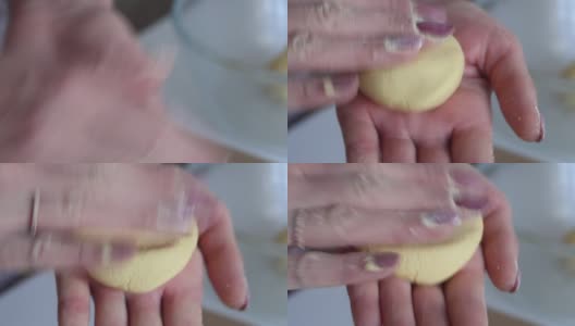 一位妇女正在揉一团玉米面。准备无酵饼。特写镜头。高清在线视频素材下载