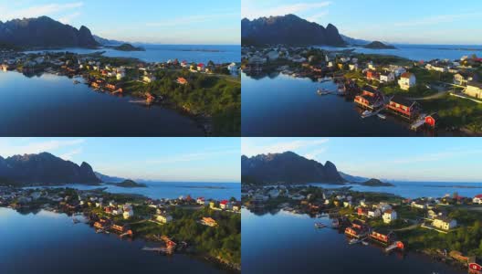 挪威罗浮敦群岛上的小渔村哈姆诺伊的航拍镜头，以其典型的红色房屋和自然美景成为热门旅游目的地。空中4k超高清。高清在线视频素材下载