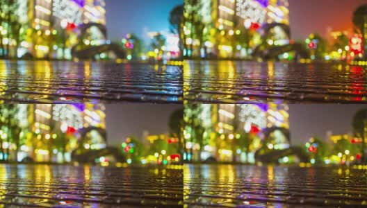 夜光照亮武汉市中心广场现代艺术纪念碑模糊了4k时间的中国全景高清在线视频素材下载
