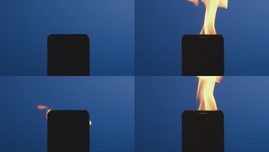 慢镜头:智能手机燃烧的剪影高清在线视频素材下载