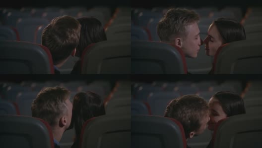 年轻的男孩和女孩沉迷于电影的激情。接吻的情侣高清在线视频素材下载