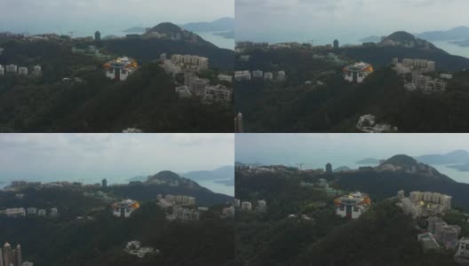 白天拍摄香港著名的维多利亚山顶综合鸟瞰图4k高清在线视频素材下载