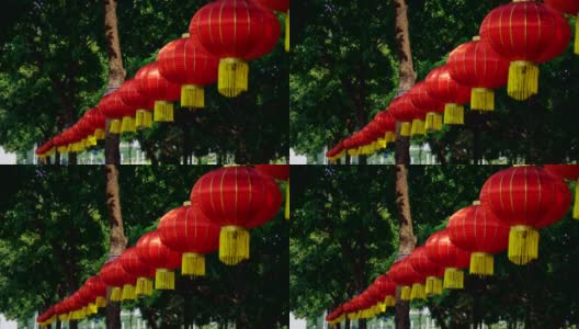 中国装饰灯笼。纸灯笼挂在户外的公园里。股票视频…高清在线视频素材下载
