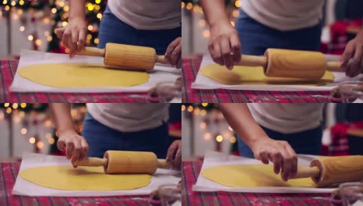 女人在寒假在家做姜饼。为圣诞节和新年自制的圣诞饼干。高清在线视频素材下载