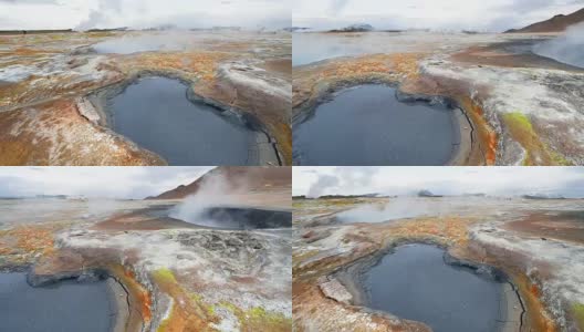 冰岛间歇泉喷发。红色的土壤，就像火星表面一样高清在线视频素材下载