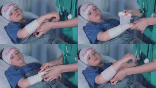 4k医院拍摄的一个生病的孩子，医生在受伤的手臂上敷绷带高清在线视频素材下载