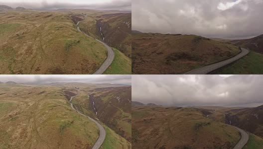 鸟瞰图B4391通过沼泽和山脉的威尔士接近瀑布，英国高清在线视频素材下载
