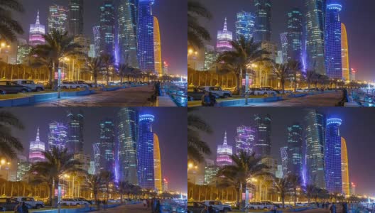 从卡塔尔滨海大道(Corniche)看夜晚多哈的天际线和繁星点点的天空高清在线视频素材下载
