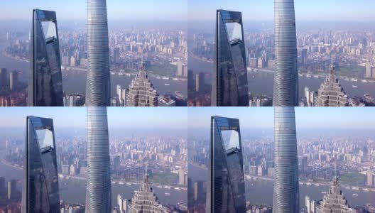 鸟瞰图摩天大楼和高层写字楼在上海中心与黄浦江，中国。金融区和商业中心在亚洲智慧城市的日出。高清在线视频素材下载