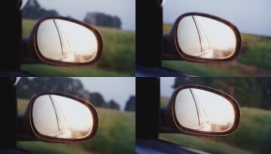 开车时，太阳反射在汽车的后视镜上高清在线视频素材下载