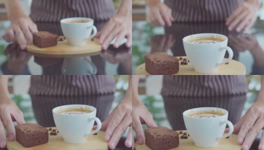 咖啡师在咖啡馆为顾客提供热饮料高清在线视频素材下载