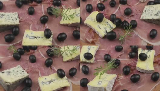 火腿，橄榄和蓝奶酪，传统的开胃菜，背景菜高清在线视频素材下载