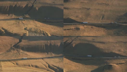 俄勒冈州，大约2021年:半卡车沿着哥伦比亚河峡谷行驶的鸟瞰图。用直升机用RED 8K拍摄的Cineflex。高清在线视频素材下载