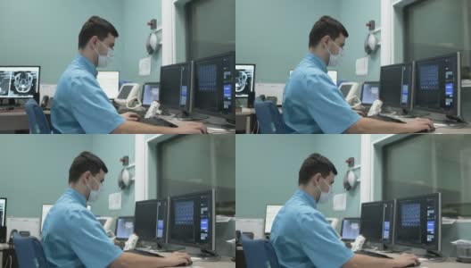 核磁共振成像操作员对病人的大脑进行扫描高清在线视频素材下载