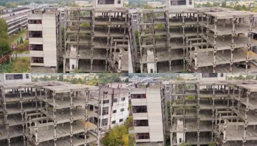 工业破坏的城市建筑。破坏性废弃建筑的鸟瞰图。高清在线视频素材下载