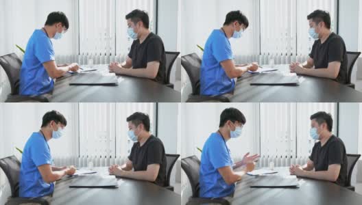 男医生在医院谈会诊后与患者握手的4k视频高清在线视频素材下载