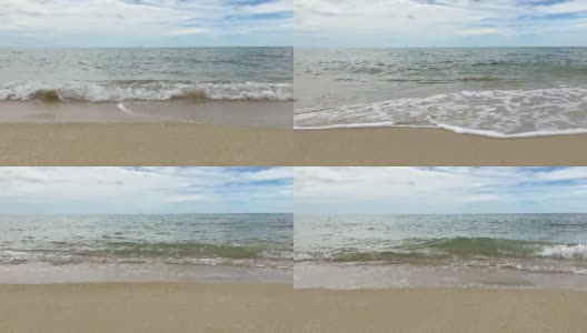 海景,海景。美丽的蓝色大海，云和天空与海浪撞击沙滩海岸。美丽的热带海滩，海浪与地平线。高清在线视频素材下载