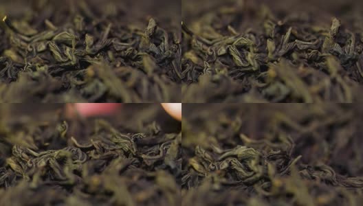 背景质感Sencha绿茶-清新，甘甜，茶香细腻。红茶特写背景。堆干红茶，质地。微距镜头高清在线视频素材下载