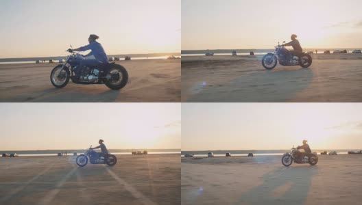 骑摩托车的人在日落或日出时在路上驾驶摩托车高清在线视频素材下载