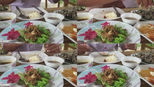 在餐馆吃各种泰国辛辣食物高清在线视频素材下载