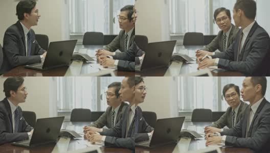 视频中，中国商人在办公室开会高清在线视频素材下载