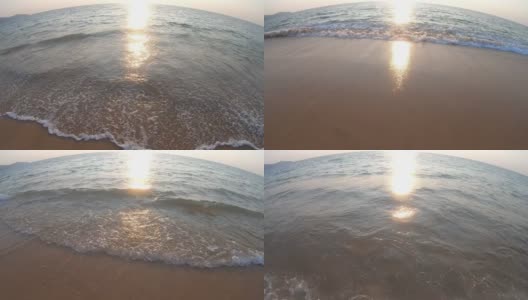 鱼眼镜头:海滩上的波浪。高清在线视频素材下载