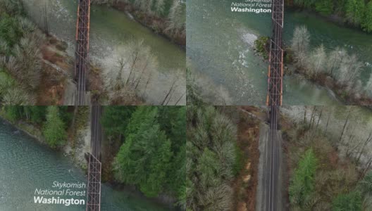 在天空科米什河上的生锈铁路桥与浮动文本的自上而下无人机拍摄高清在线视频素材下载