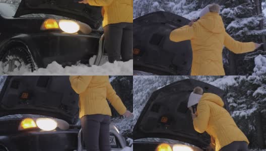 汽车在第一场雪中抛锚了。紧急照明设备。在恶劣的天气下，汽车会在偏僻的地方抛锚。汽车保险。一个女人在路上。高清在线视频素材下载
