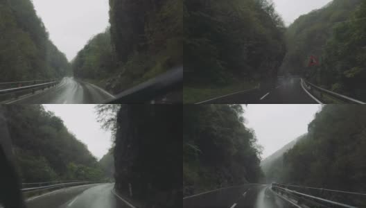 POV车在雨中行驶在山口:危险的道路高清在线视频素材下载