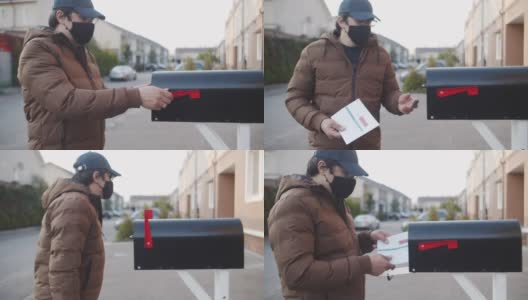 一名戴着可重复使用的保护面罩的男子将装有选票的信件放入住所附近的邮筒高清在线视频素材下载