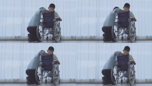 患有自闭症、腿部残疾、坐在轮椅上的儿童来看医生高清在线视频素材下载