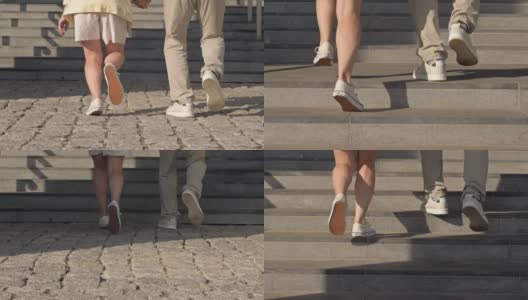 男女脚在舒适的休闲鞋上跑楼梯。成熟的夫妇很容易爬上石阶。后视图高清在线视频素材下载